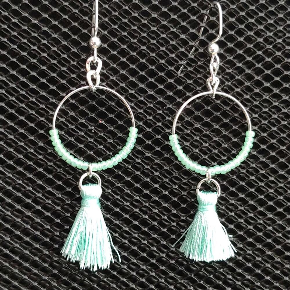 Aqua green silver hoop & tassel earrings.